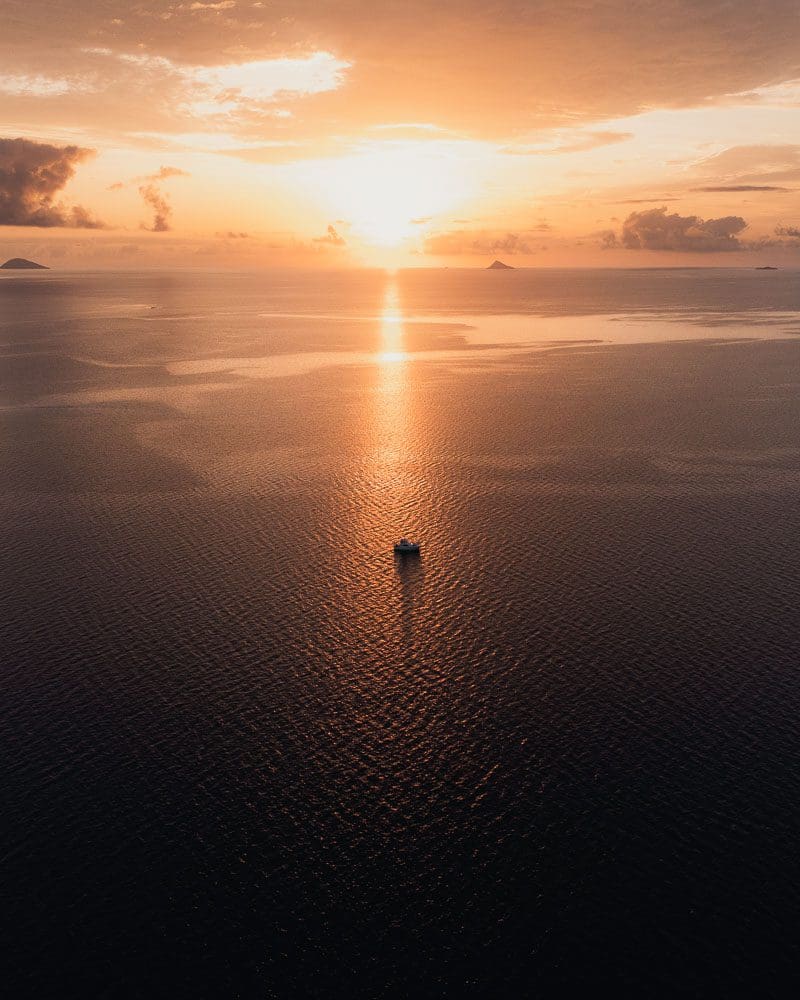 Boat anchored on the Great barrier Reef while Fishing Cape Flattery