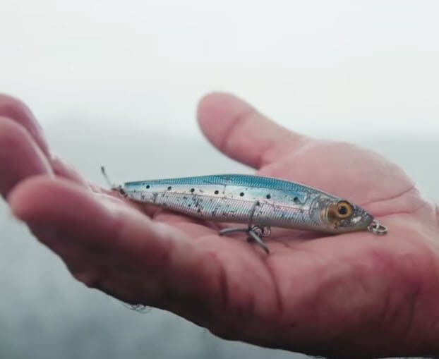 Well used fishing lure with treble hooks