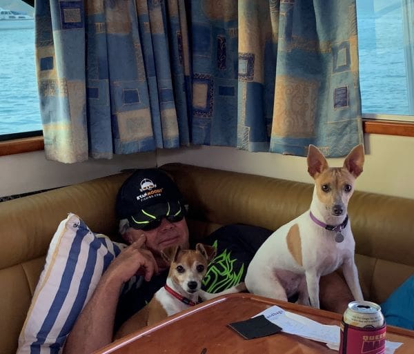 Lazing in the saloon during a fuel stop at Cooktown - before social distancing.
